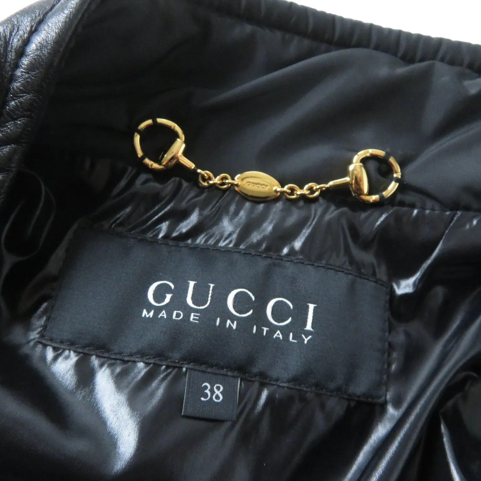 GUCCI Down jacket Outer: 100% polyester, Part: Leather, Lining: 100% polyamide (nylon), Filling: 90% down, Filling: 10% feather black Women 38 Used